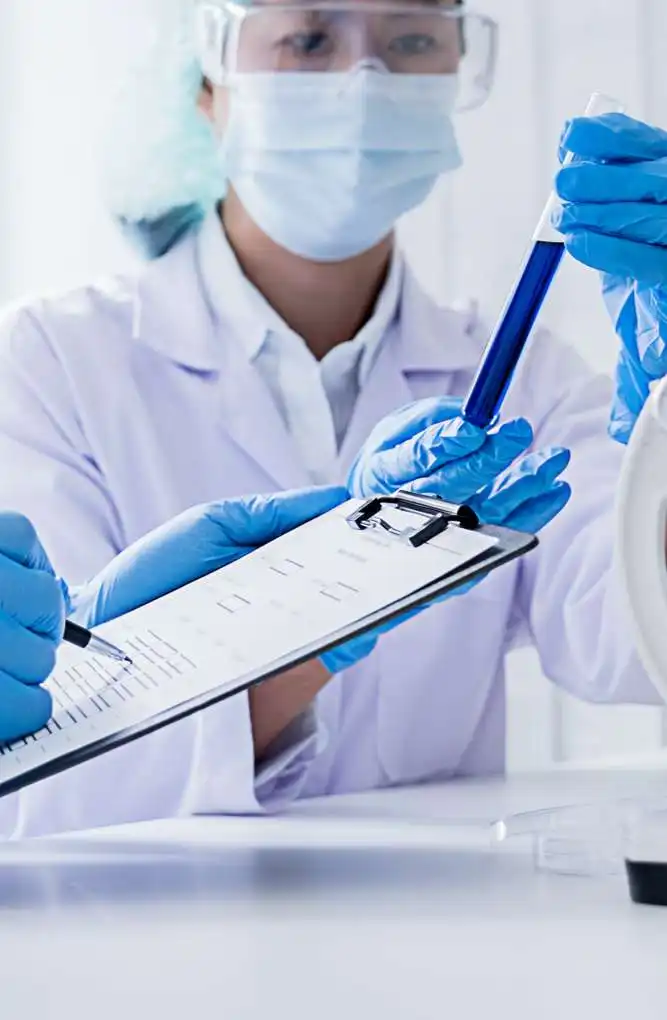 Technician reviewing a specimen against its custody form